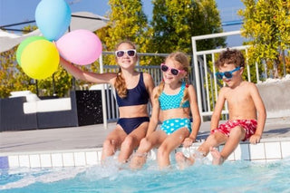 Kids at the pool wearing Child Safety Wristbands